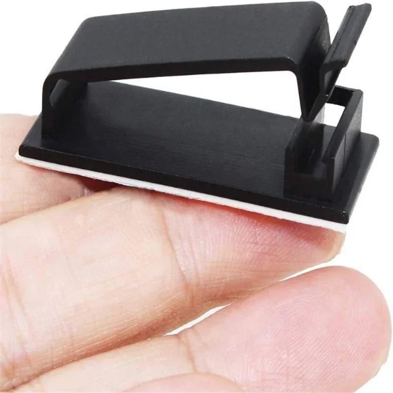 WaveGear Inc. cable organizer wire clip securing and managing multiple cables on a desk or wall for neatness.