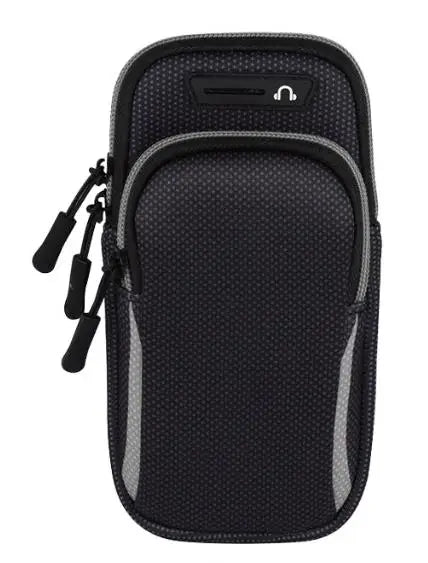 WaveGear Inc. universal smartphone arm band worn on a person's arm, designed for travel and exercise, with adjustable strap and secure pocket.