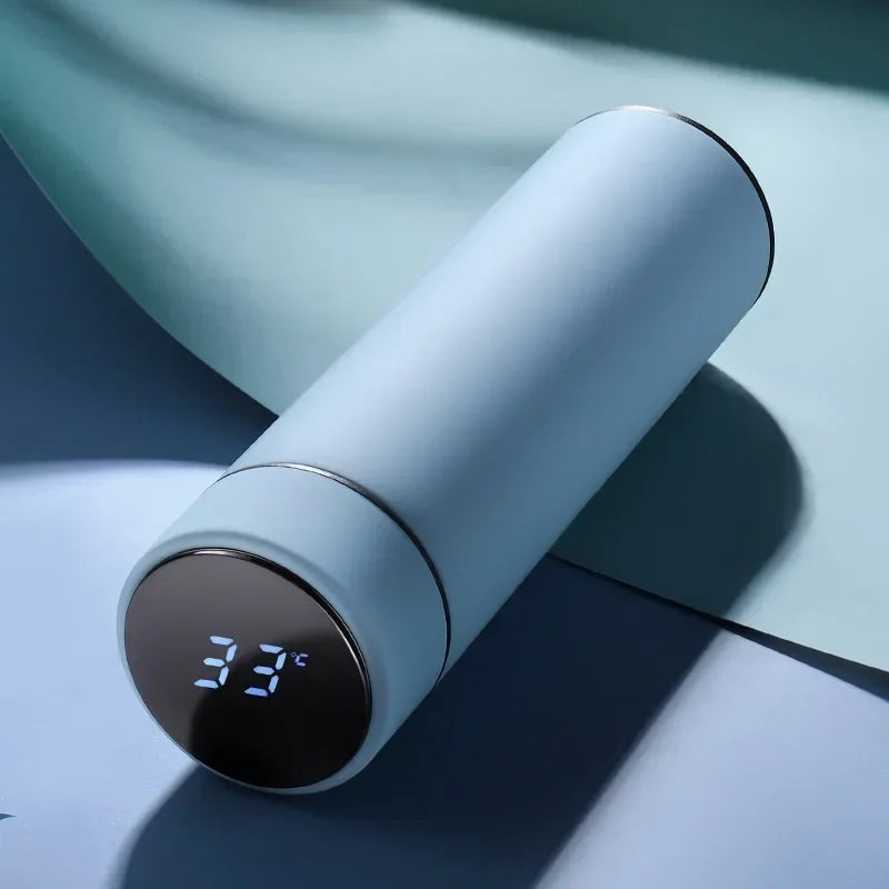 WaveGear Inc. thermos cup with temperature display, designed for exercise, showing a sleek stainless steel exterior and digital temperature readout.
