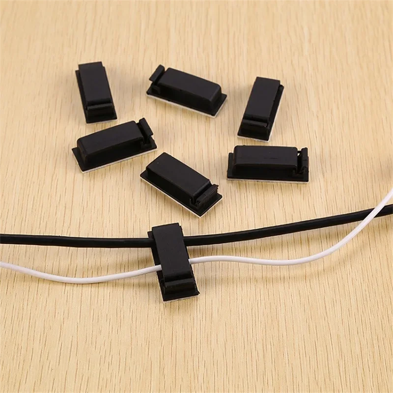 WaveGear Inc. cable organizer wire clip holding and managing cables neatly on a surface for easy access and organization.