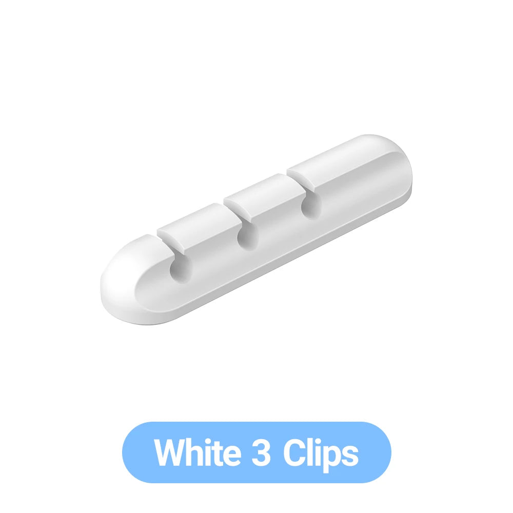 WireNest™ adhesive cable holder by WaveGear Inc.™ securing and organizing multiple cables on a desk or wall.