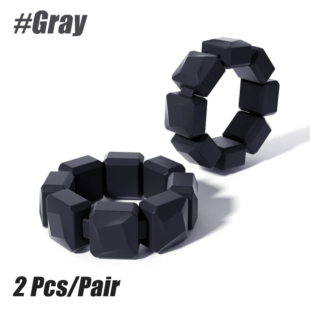 Adjustable WaveGear Inc. wrist and ankle weights for exercise, shown in a close-up of the soft padded straps and metal weights.