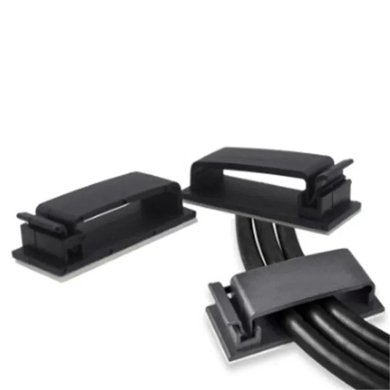 WaveGear Inc. cable organizer wire clip holding multiple cables, designed to keep wires tidy and prevent tangling.